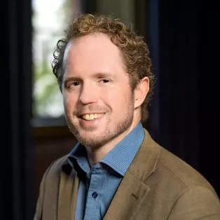 Porträtt av David Riebe. Foto.